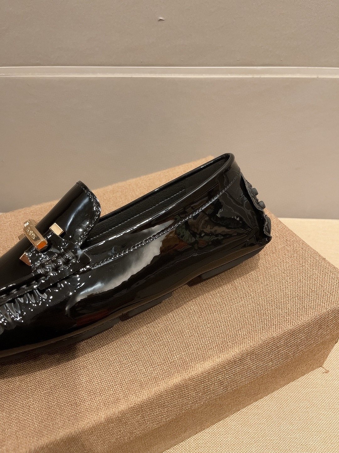Tod's Glossy Metal Bar Loafers