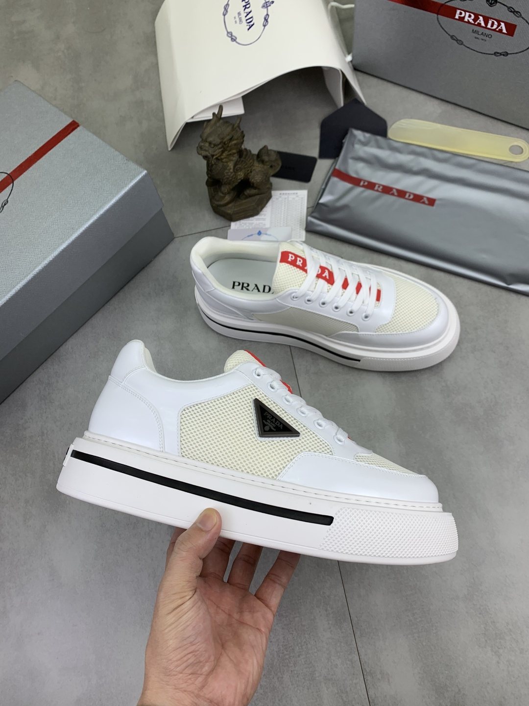 Prada Triangle Patch Low-Top Sneakers