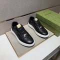 Gucci Men's Embossed Low-Top Sneakers
